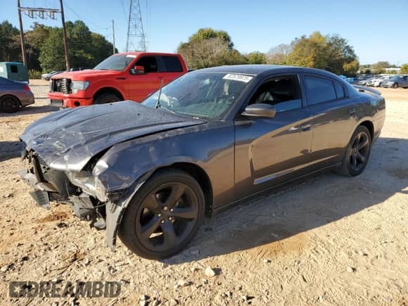 2014 Dodge Charger SXT Plus with VIN 2C3CDXHG1EH202154, listed as a Copart auction lot 82579975 with 182,563 mi miles and Salvage title. Bid and sale history available at DreamBid. Image 1.
