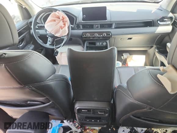 2023 Honda Pilot EX-L z VIN 5FNYG1H43PB015700, wystawiony jako Copart lot #65248255 z przebiegiem Nie podano mil oraz Szkoda całkowita • Salvage title. Historia ofert i sprzedaży dostępna na DreamBid. Obrazek 8.