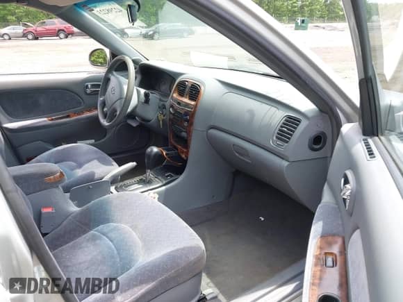 2001 Hyundai Sonata GLS z VIN KMHWF35V41A384371, wystawiony jako IAAI lot #42298223 z przebiegiem 149 284 mil mil oraz . Historia ofert i sprzedaży dostępna na DreamBid. Obrazek 5.