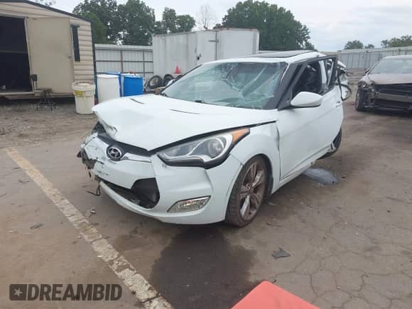 2013 Hyundai Veloster w/Black Int z VIN KMHTC6AD0DU155604, wystawiony jako IAAI lot #43314820 z przebiegiem 141 866 mil mil oraz . Historia ofert i sprzedaży dostępna na DreamBid. Obrazek 18.
