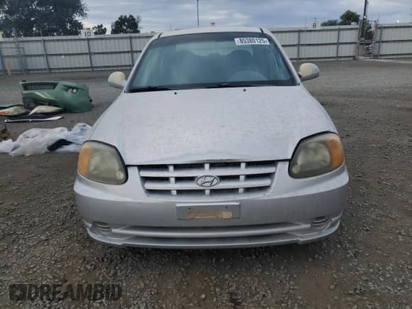 2005 Hyundai Accent GLS z VIN KMHCG45C25U604342, wystawiony jako Copart lot #85380125 z przebiegiem 165 690 mil mil oraz Czysty tytuł • Clean title. Historia ofert i sprzedaży dostępna na DreamBid. Obrazek 5.