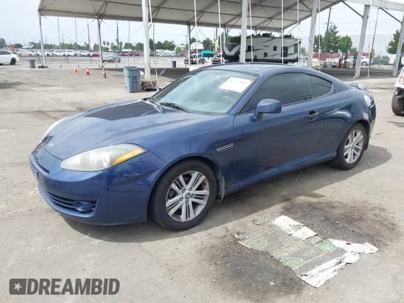 2007 Hyundai Tiburon GS with VIN KMHHM66D47U253809, listed as a IAAI auction lot 42777962 with 176,002 mi miles and . Bid and sale history available at DreamBid. Image 17.