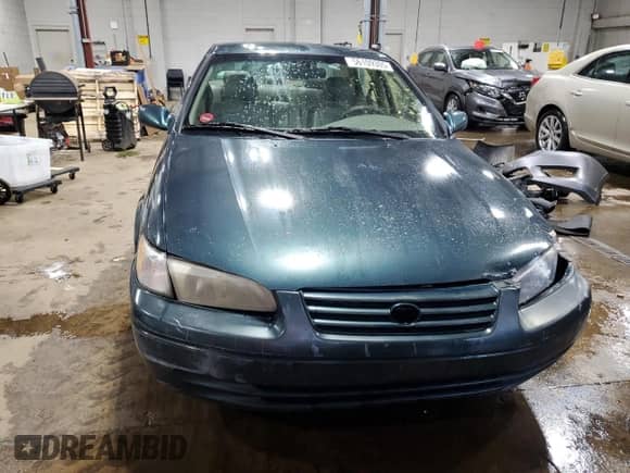 1997 Toyota Camry LE z VIN JT2BF22K0V0047532, wystawiony jako Copart lot #56109305 z przebiegiem 262 576 mil mil oraz Szkoda całkowita • Salvage title. Historia ofert i sprzedaży dostępna na DreamBid. Obrazek 5.
