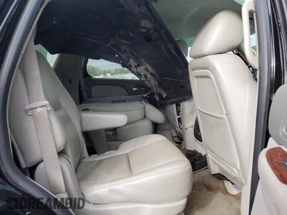 2012 Chevrolet Tahoe LTZ z VIN 1GNSCCE08CR279697, wystawiony jako Copart lot #79423014 z przebiegiem 217 990 mil mil oraz Szkoda całkowita • Salvage title. Historia ofert i sprzedaży dostępna na DreamBid. Obrazek 11.