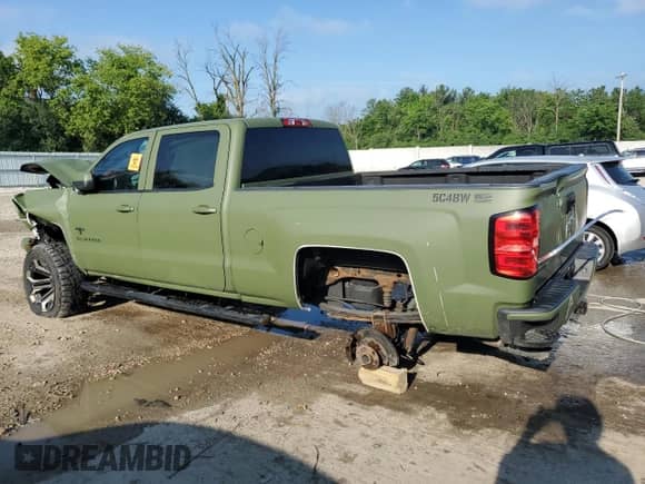 2018 Chevrolet Silverado 1500 LT z VIN 3GCUKREC6JG500373, wystawiony jako Copart lot #61946725 z przebiegiem Nie podano mil oraz Nie do naprawy • Non repairable. Historia ofert i sprzedaży dostępna na DreamBid. Obrazek 2.