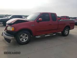 2001 Ford F-150 with VIN 2FTZX17281CA44273, listed as a Copart auction lot 63678044 with 175,404 mi miles and Salvage title. Bid and sale history available at DreamBid. Image 1.