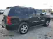 2010 Chevrolet Tahoe LTZ с VIN 1GNUKCE0XAR287678, выставлен на аукционе Copart как лот 80432845 с пробегом 207 563 миль миль и Списание • Salvage title. История ставок и продаж доступна на DreamBid. Изображение 3.