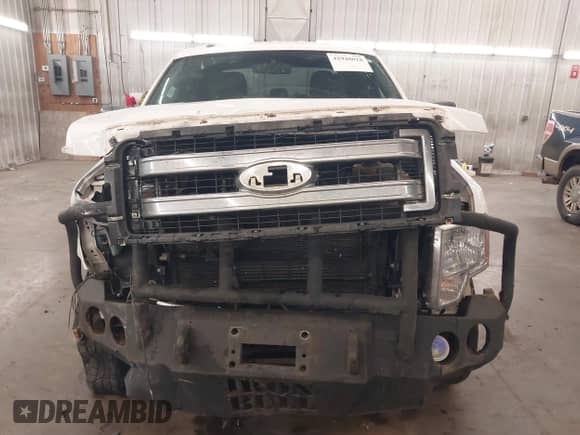 2014 Ford F-150 XLT with VIN 1FTFW1EF4EKG05646, listed as a IAAI auction lot 42948018 with 254,460 mi miles and . Bid and sale history available at DreamBid. Image 13.