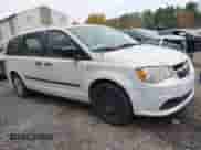 2014 Dodge Grand Caravan SE with VIN 2C4RDGBG6ER458881, listed as a IAAI auction lot 43574110 with 189,082 mi miles and . Bid and sale history available at DreamBid. Image 1.