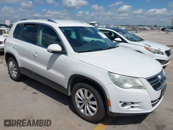 2011 Volkswagen Tiguan SE with VIN WVGAV7AX6BW557338, listed as a IAAI auction lot 42726724 with 175,004 mi miles and . Bid and sale history available at DreamBid. Image 1.