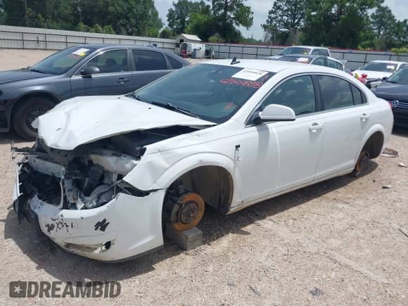 2009 Saturn Aura XE with VIN 1G8ZS57B89F186588, listed as a IAAI auction lot 42604828 with 242,279 mi miles and . Bid and sale history available at DreamBid. Image 2.