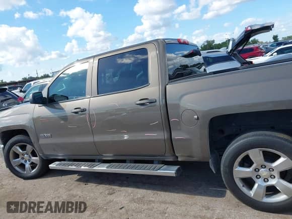 2014 Chevrolet Silverado 1500 LT z VIN 3GCPCREC9EG401885, wystawiony jako IAAI lot #43273797 z przebiegiem 216 606 mil mil oraz . Historia ofert i sprzedaży dostępna na DreamBid. Obrazek 14.