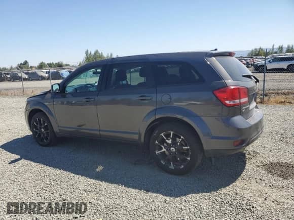 2018 Dodge Journey GT with VIN 3C4PDDEG3JT463299, listed as a Copart auction lot 65776235 with 131,978 mi miles and Salvage title. Bid and sale history available at DreamBid. Image 2.