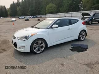 2014 Hyundai Veloster z VIN KMHTC6ADXEU187204, wystawiony jako Copart lot #71670725 z przebiegiem 94 917 mil mil oraz Czysty tytuł • Clean title. Historia ofert i sprzedaży dostępna na DreamBid. Obrazek 1.