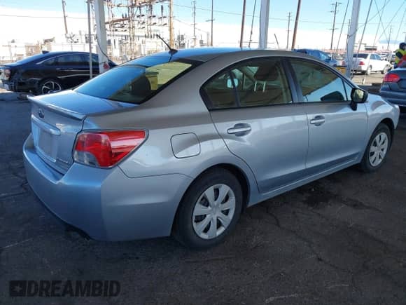 2015 Subaru Impreza with VIN JF1GJAA62FG012595, listed as a IAAI auction lot 41323974 with 70,106 mi miles and . Bid and sale history available at DreamBid. Image 4.