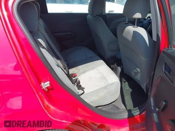 2015 Chevrolet Sonic LS with VIN 1G1JA6SH8F4159267, listed as a IAAI auction lot 42705619 with 116,650 mi miles and . Bid and sale history available at DreamBid. Image 8.