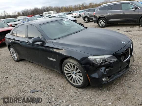 2011 BMW 7 Series 750i xDrive with VIN WBAKC6C55BC395480, listed as a Copart auction lot 70339504 with 89,972 mi miles and Clean title. Bid and sale history available at DreamBid. Image 4.