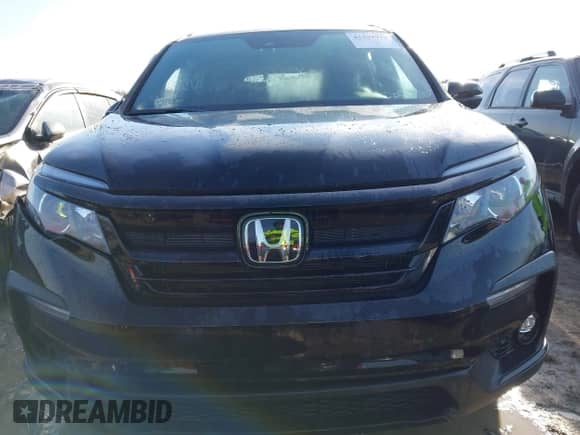2022 Honda Pilot TrailSport with VIN 5FNYF6H8XNB085971, listed as a IAAI auction lot 41797773 with 55,095 mi miles and . Bid and sale history available at DreamBid. Image 12.