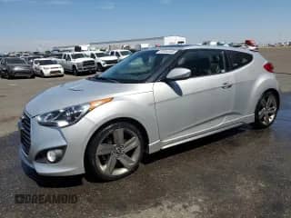 2013 Hyundai Veloster Turbo с VIN KMHTC6AEXDU106046, выставлен на аукционе Copart как лот 67844345 с пробегом 102 025 миль миль и Чистый • Clean title. История ставок и продаж доступна на DreamBid. Изображение 1.
