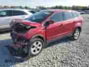 2014 Ford Escape SE with VIN 1FMCU0GX3EUB59059, listed as a Copart auction lot 87624585 with 117,007 mi miles and Salvage title. Bid and sale history available at DreamBid. Image 1.