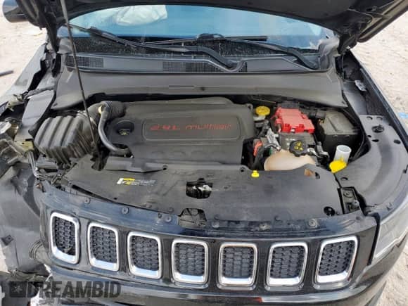 2021 Jeep Compass Latitude with VIN 3C4NJDBBXMT584022, listed as a Copart auction lot 69013615 with 74,898 mi miles and Salvage title. Bid and sale history available at DreamBid. Image 12.
