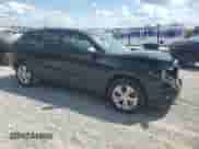 2024 Chevrolet Trax LS with VIN KL77LFE22RC025980, listed as a Copart auction lot 70894755 with 67,413 mi miles and Salvage title. Bid and sale history available at DreamBid. Image 4.