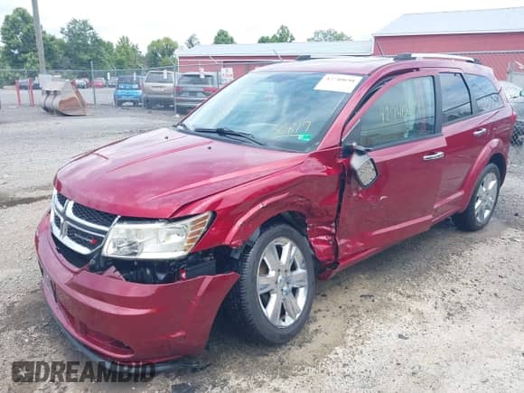 2011 Dodge Journey LUX z VIN 3D4PH9FG3BT513817, wystawiony jako IAAI lot #42740698 z przebiegiem 93 083 mil mil oraz . Historia ofert i sprzedaży dostępna na DreamBid. Obrazek 2.