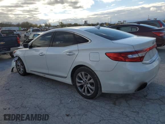 2013 Hyundai Azera с VIN KMHFG4JG2DA218865, выставлен на аукционе Copart как лот 79043754 с пробегом 135 506 миль миль и Списание • Salvage title. История ставок и продаж доступна на DreamBid. Изображение 2.