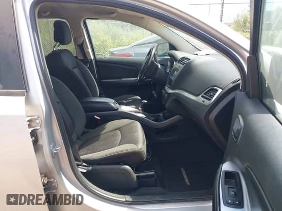 2012 Dodge Journey SE z VIN 3C4PDCAB9CT204727, wystawiony jako IAAI lot #42670588 z przebiegiem 157 007 mil mil oraz . Historia ofert i sprzedaży dostępna na DreamBid. Obrazek 5.