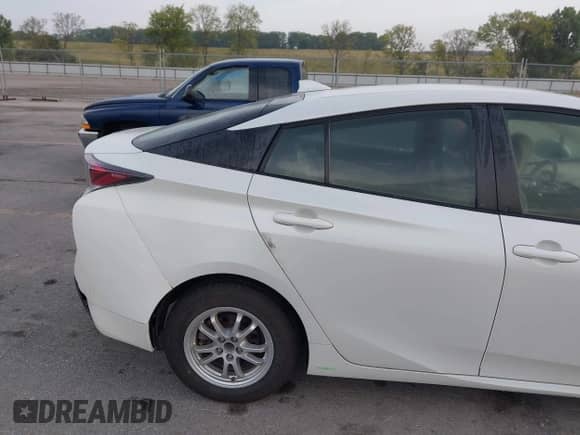 2016 Toyota Prius Two z VIN JTDKBRFU2G3522042, wystawiony jako IAAI lot #43234763 z przebiegiem 89 388 mil mil oraz . Historia ofert i sprzedaży dostępna na DreamBid. Obrazek 19.