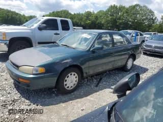 1996 Toyota Camry DX с VIN 4T1BG12K5TU651447, выставлен на аукционе Copart как лот 67166645 с пробегом 155 612 миль миль и Чистый • Clean title. История ставок и продаж доступна на DreamBid. Изображение 1.