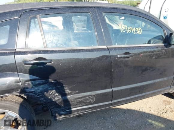 2011 Dodge Caliber Uptown with VIN 1B3CB9HB2BD172349, listed as a IAAI auction lot 42901430 with 141,201 mi miles and . Bid and sale history available at DreamBid. Image 13.