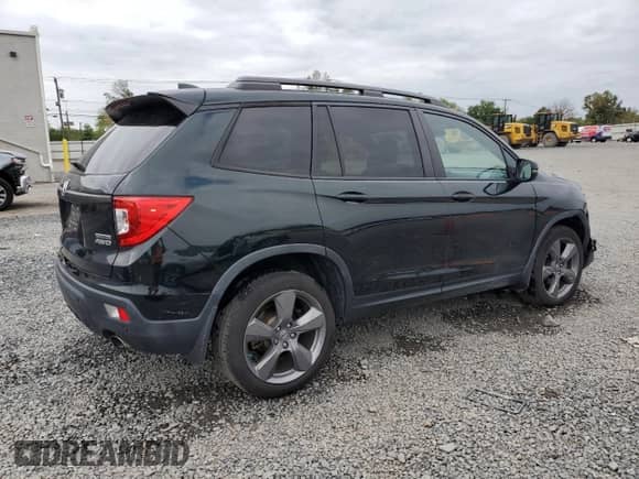 2020 Honda Passport Touring z VIN 5FNYF8H92LB001868, wystawiony jako Copart lot #81558535 z przebiegiem 91 722 mil mil oraz Szkoda całkowita • Salvage title. Historia ofert i sprzedaży dostępna na DreamBid. Obrazek 3.