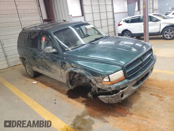 1998 Dodge Durango с VIN 1B4HS28Y6WF171485, выставлен на аукционе Copart как лот 67896655 с пробегом 215 057 миль миль и Списание • Salvage title. История ставок и продаж доступна на DreamBid. Изображение 4.