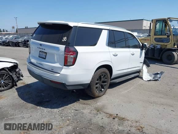 2021 Chevrolet Tahoe LT z VIN 1GNSCNKD7MR103115, wystawiony jako IAAI lot #42519654 z przebiegiem 47 834 mil mil oraz . Historia ofert i sprzedaży dostępna na DreamBid. Obrazek 4.