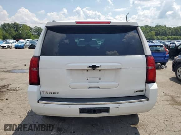 2018 Chevrolet Tahoe Premier with VIN 1GNSKCKC4JR376233, listed as a Copart auction lot 68965735 with 95,327 mi miles and Salvage title. Bid and sale history available at DreamBid. Image 6.