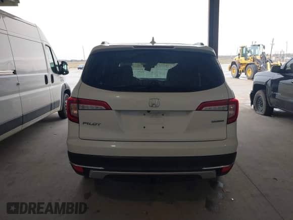 2020 Honda Pilot Touring 7-Passenger z VIN 5FNYF5H60LB026398, wystawiony jako IAAI lot #41294517 z przebiegiem 52 917 mil mil oraz . Historia ofert i sprzedaży dostępna na DreamBid. Obrazek 16.