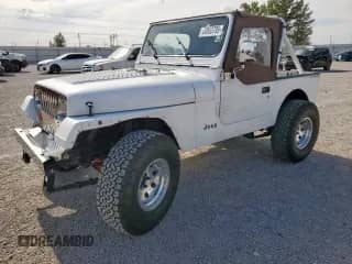 1991 Jeep Wrangler z VIN 2J4FY29S2MJ134550, wystawiony jako Copart lot #64953795 z przebiegiem 218 460 mil mil oraz Czysty tytuł • Clean title. Historia ofert i sprzedaży dostępna na DreamBid. Obrazek 1.