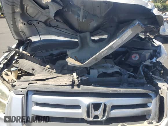 2006 Honda Pilot LX с VIN 2HKYF18136H556660, выставлен на аукционе Copart как лот 67755065 с пробегом 122 936 миль миль и Списание • Salvage title. История ставок и продаж доступна на DreamBid. Изображение 12.