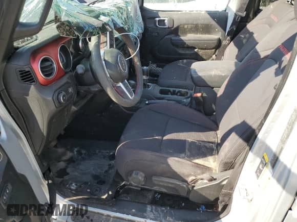 2023 Jeep Wrangler Rubicon with VIN 1C4HJXFN4PW658567, listed as a Copart auction lot 75758084 with 16,030 mi miles and Salvage title. Bid and sale history available at DreamBid. Image 7.