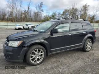 2013 Dodge Journey R/T with VIN 3C4PDDFG2DT614751, listed as a Copart auction lot 82592325 with 145,037 mi miles and Salvage title. Bid and sale history available at DreamBid. Image 1.