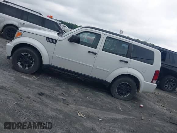 2011 Dodge Nitro SE с VIN 1D4PT2GK8BW522225, выставлен на аукционе IAAI как лот 41736750 с пробегом 173 675 миль миль и . История ставок и продаж доступна на DreamBid. Изображение 3.