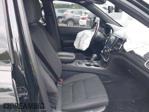 2019 Jeep Grand Cherokee Altitude with VIN 1C4RJFAG6KC614037, listed as a IAAI auction lot 42318595 with 130,575 mi miles and . Bid and sale history available at DreamBid. Image 5.