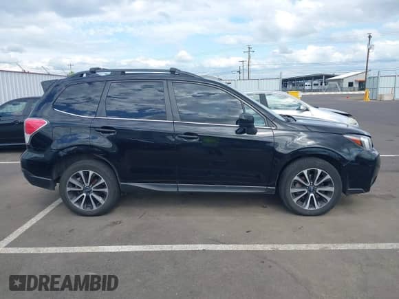 2018 Subaru Forester Premium with VIN JF2SJGECXJH524164, listed as a IAAI auction lot 42193260 with 172,304 mi miles and . Bid and sale history available at DreamBid. Image 13.