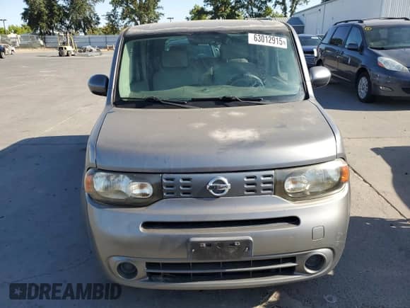 2009 Nissan Cube SL с VIN JN8AZ28R69T127134, выставлен на аукционе Copart как лот 63012915 с пробегом 241 581 миль миль и Чистый • Clean title. История ставок и продаж доступна на DreamBid. Изображение 5.