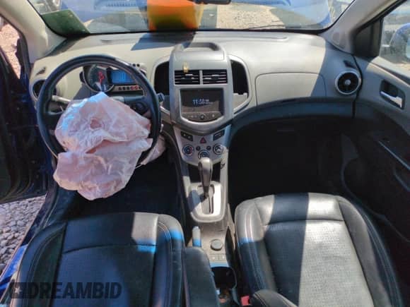 2013 Chevrolet Sonic LTZ с VIN 1G1JE6SB5D4127390, выставлен на аукционе Copart как лот 56005845 с пробегом 184 905 миль миль и Списание • Salvage title. История ставок и продаж доступна на DreamBid. Изображение 8.