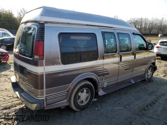 1996 Chevrolet Chevy Van with VIN 1GBFG15M7T1003777, listed as a Copart auction lot 43272715 with 109,884 mi miles and Salvage title. Bid and sale history available at DreamBid. Image 3.