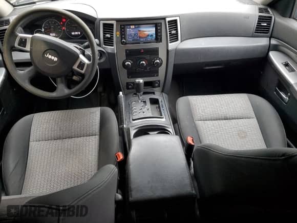 2009 Jeep Grand Cherokee Rocky Mountain с VIN 1J8GR48K29C549303, выставлен на аукционе Copart как лот 66736545 с пробегом 108 989 миль миль и Списание • Salvage title. История ставок и продаж доступна на DreamBid. Изображение 8.