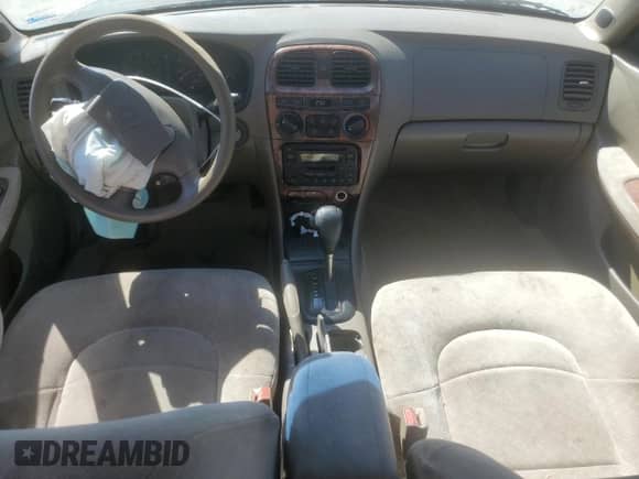2001 Hyundai Sonata GLS z VIN KMHWF35V11A485934, wystawiony jako Copart lot #69853585 z przebiegiem 120 924 mil mil oraz Szkoda całkowita • Salvage title. Historia ofert i sprzedaży dostępna na DreamBid. Obrazek 8.