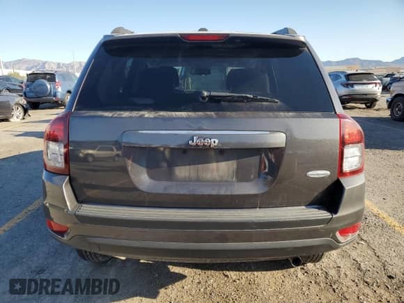 2017 Jeep Compass Latitude with VIN 1C4NJCEA5HD115980, listed as a Copart auction lot 80718455 with 56,031 mi miles and Salvage title. Bid and sale history available at DreamBid. Image 6.